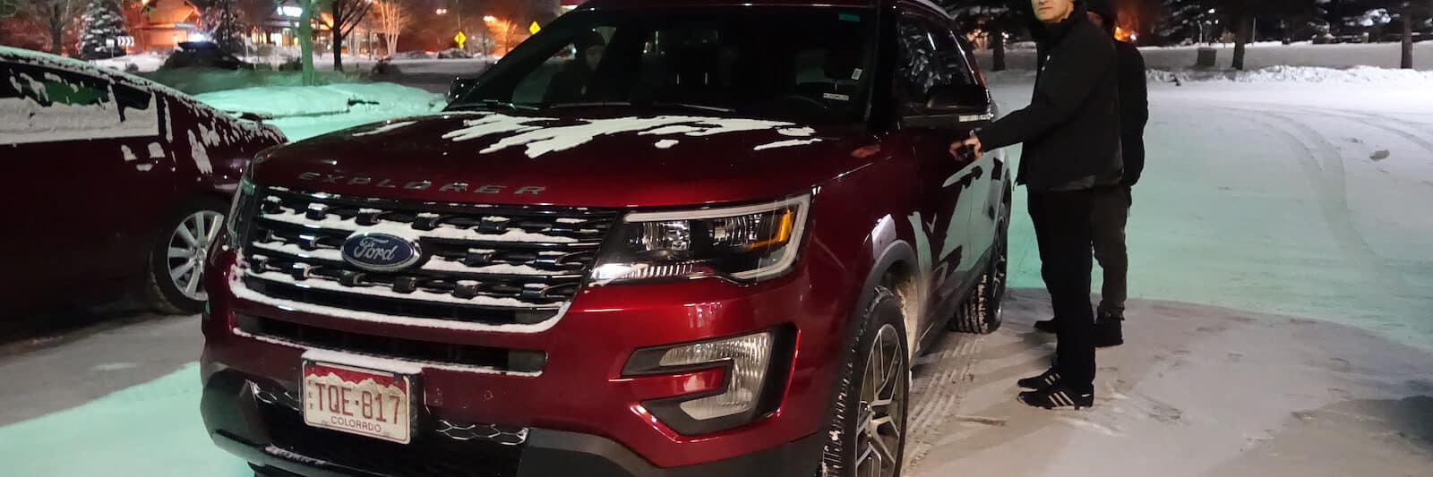 red SUV rental from Denver in Eagle, CO winter snow