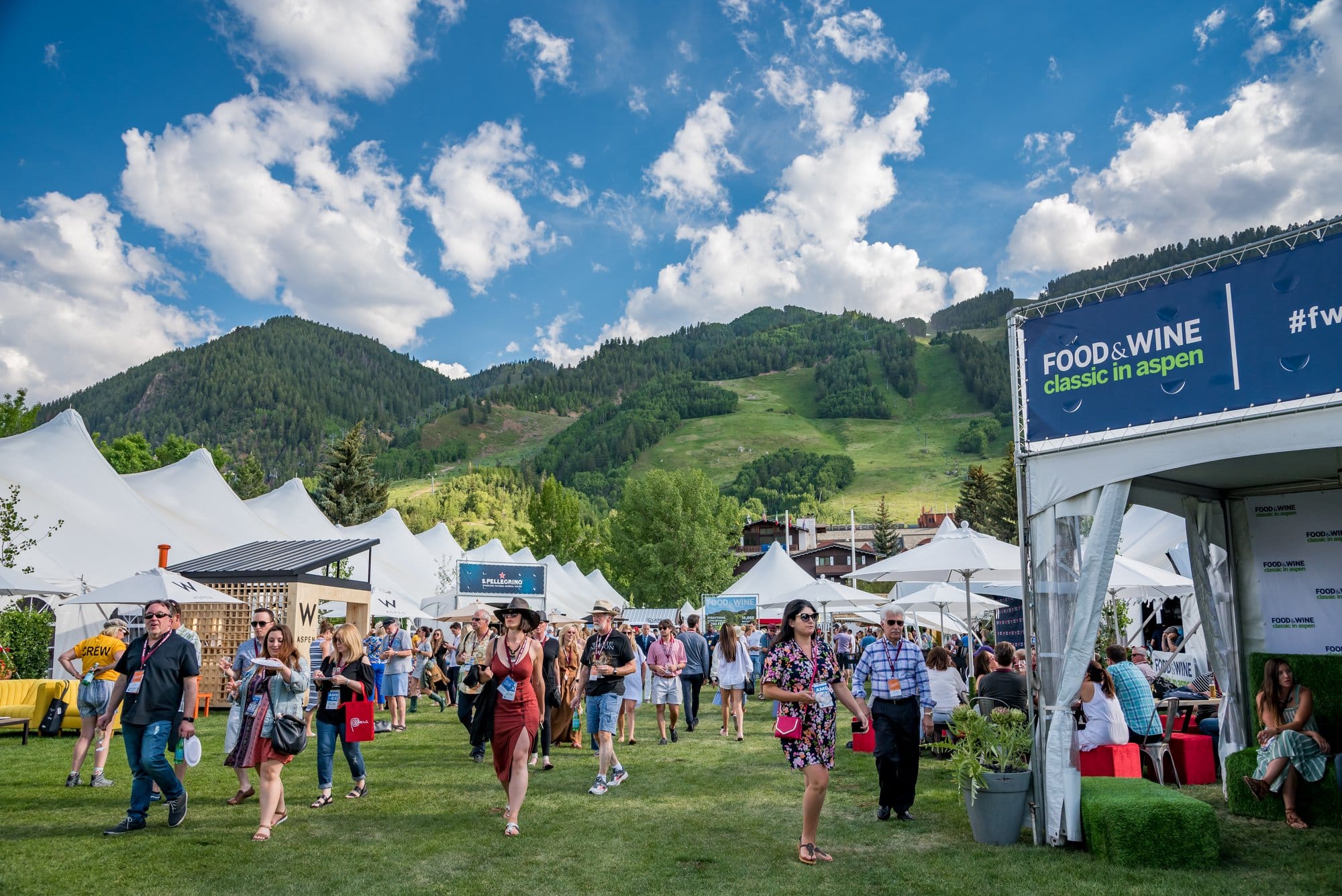 Food and wine festival in Aspen, green mountains and blue skies in the background