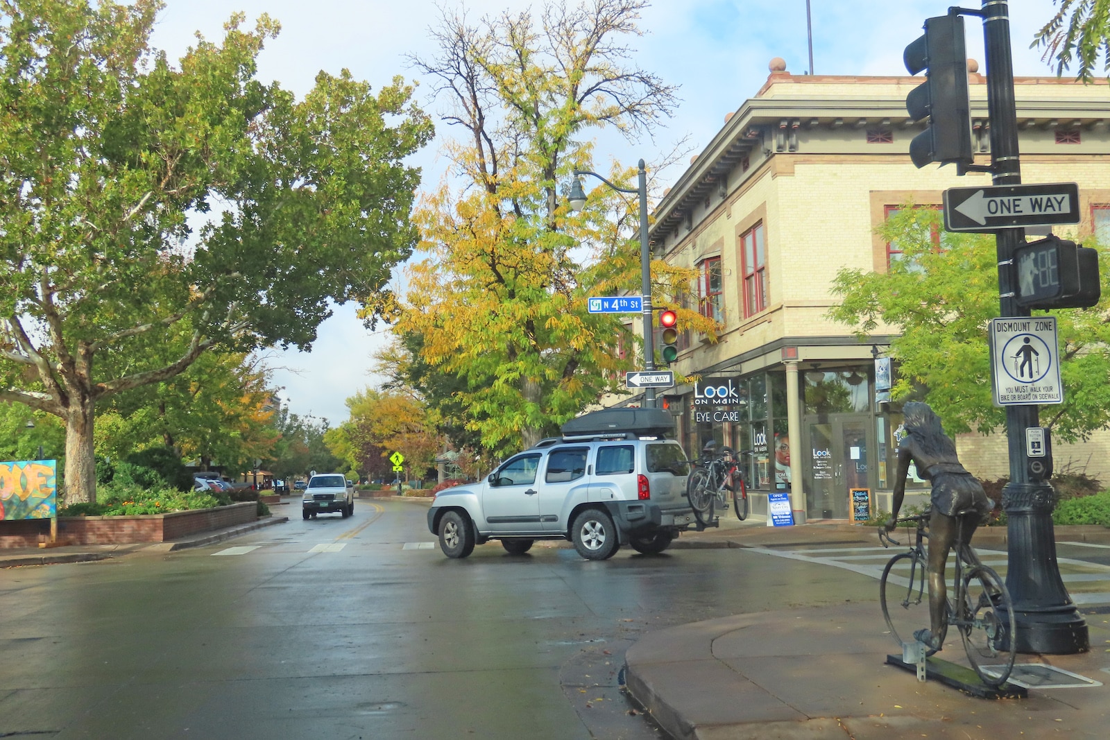 Woman biking statue in Grand Junction CO Main Street