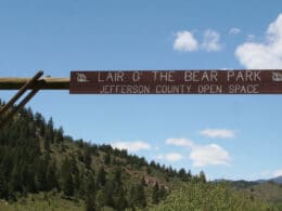 Image of a the entrance to Lair o' the Bear Park in Idledale, Colorado