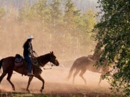 Image of people riding horses at Latigo Ranch in Kremmling, CO