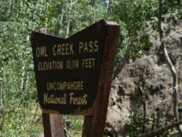 Image of the sign at Owl Creek Pass in Ridgway, Colorado
