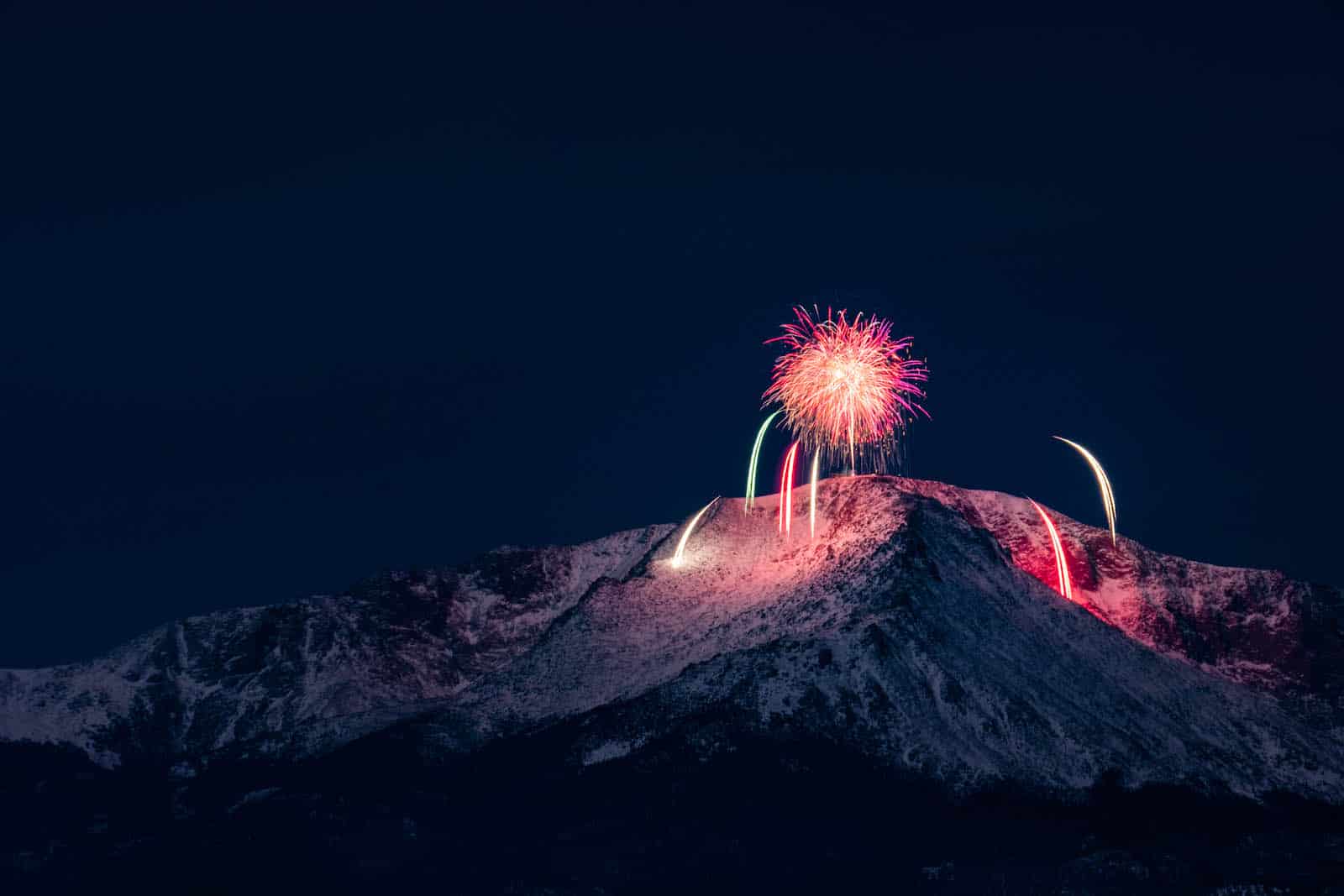 Fireworks over Pikes Peak on New Years Even at Midnight